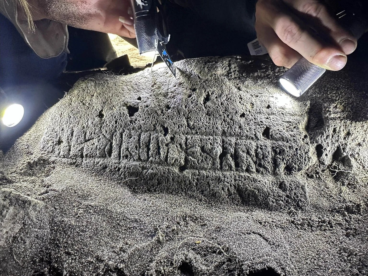 A rune stone set in a chapel floor